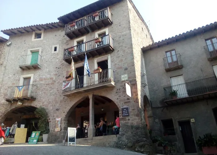 CAN MENCIÓ - Plaça Major